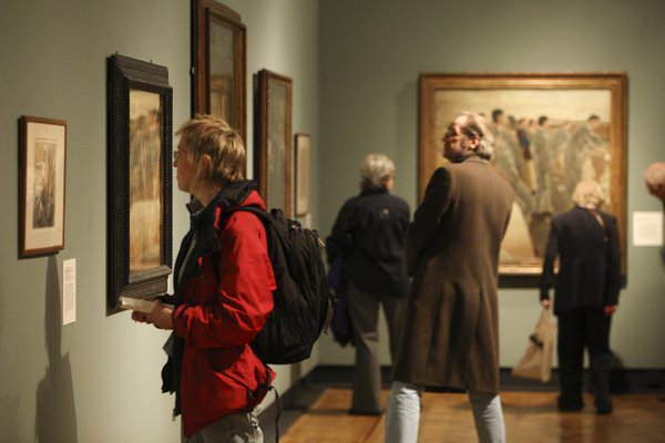 People looking at paintings in the Laing Art Gallery 